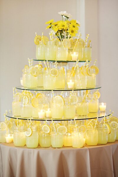 Elegant tiered display of glowing candles.