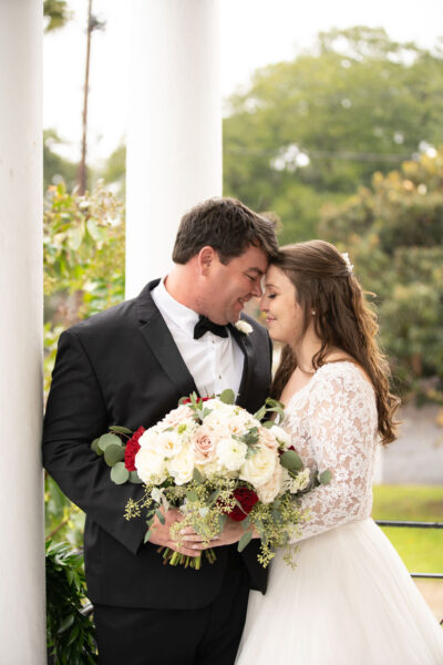 Bride and groom sharing an intimate moment on their wedding day.