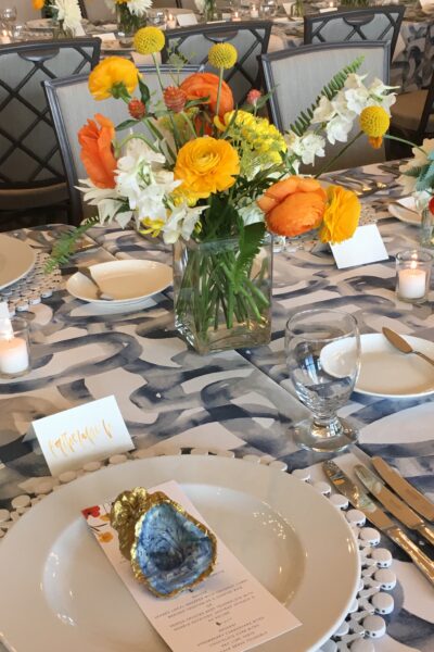 Elegant table setting with floral centerpiece and fine china.
