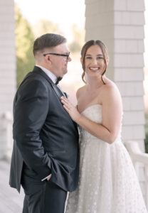 A joyful bride and groom sharing a moment on their wedding day.