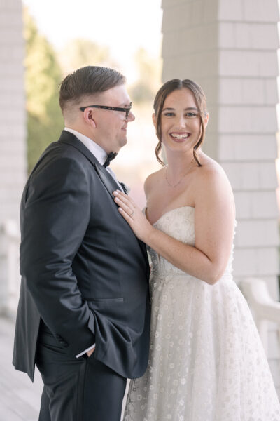 A joyful bride and groom sharing a moment on their wedding day.